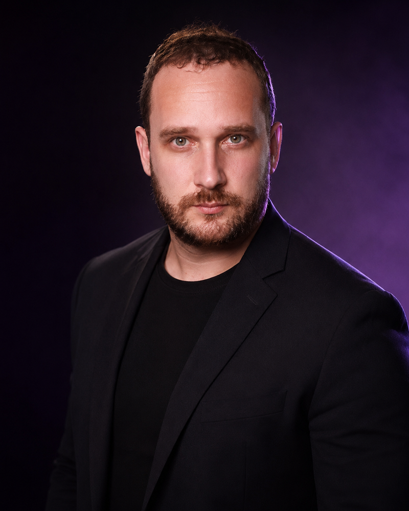 AI-enhanced corporate headshot with background cleanup