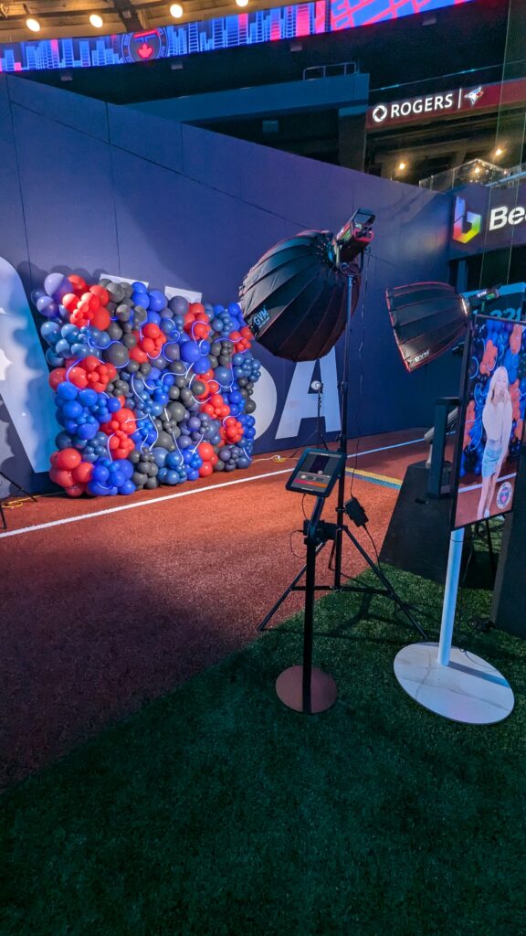 Guest recording a slow-motion Glambot video at the Blue Jays City Connect postgame event at Rogers Centre