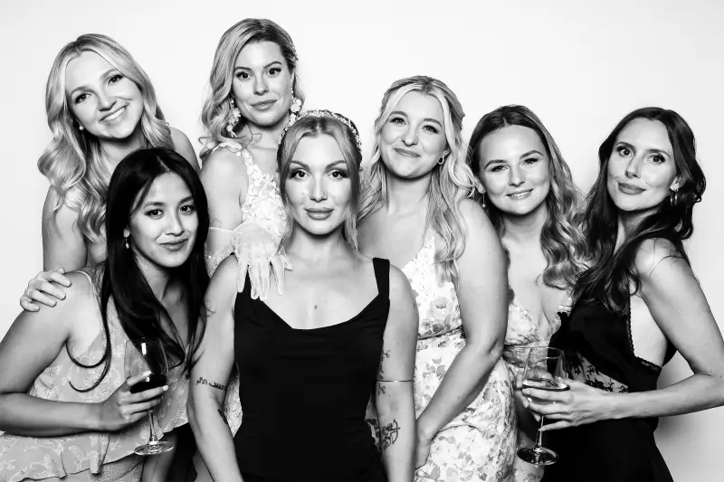 Glam photo booth in action at a Booth Empire wedding reception